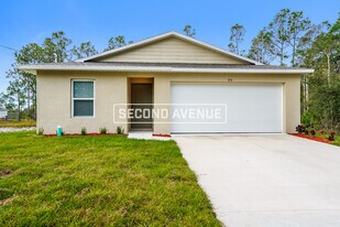 954 Pilgrim St E in Lehigh Acres, FL - Building Photo