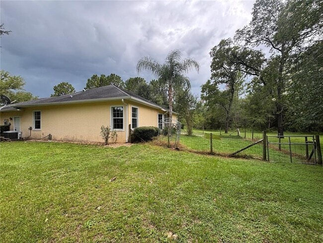 2130 Co Rd 243B in Wildwood, FL - Building Photo - Building Photo