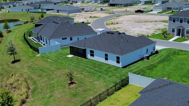 2440 BOWLING Ter in Okahumpka, FL - Building Photo - Building Photo