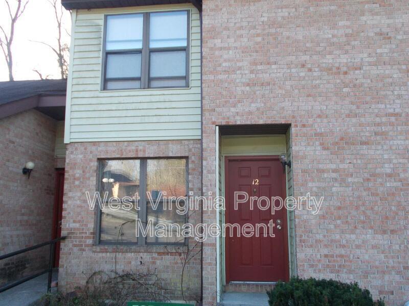 82 Beagle Club Rd in Jumping Branch, WV - Building Photo