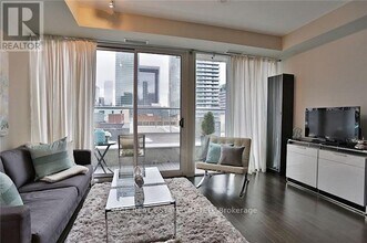 126-126 Simcoe St in Toronto, ON - Building Photo - Building Photo