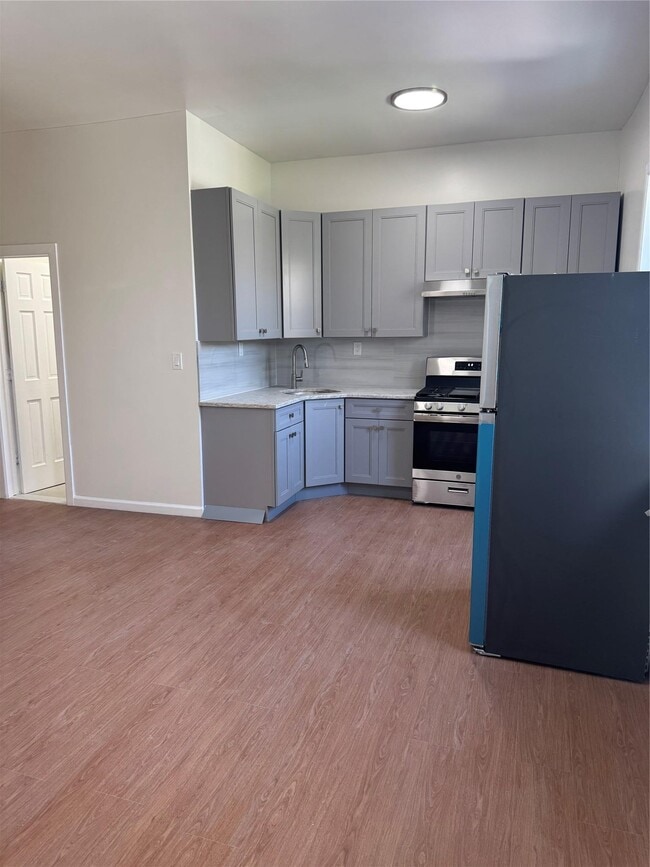 property at 56-07-56-39 39th Ave