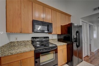 2850 N Oakland Forest Dr in Oakland Park, FL - Building Photo - Building Photo