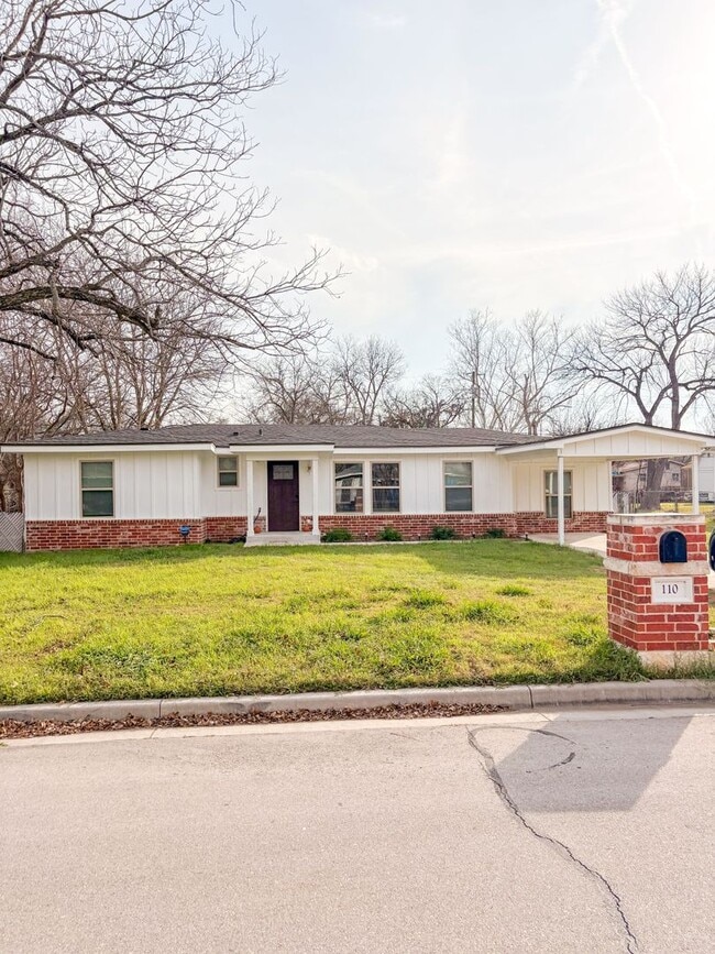 property at 110 Brewster St