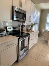 2170 Arielle Dr-Unit -709 in Naples, FL - Building Photo - Building Photo