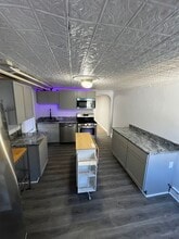 118 S Washington St, Unit 1 in Baltimore, MD - Foto de edificio - Building Photo
