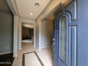 14182 W Country Gables Dr in Surprise, AZ - Building Photo - Building Photo