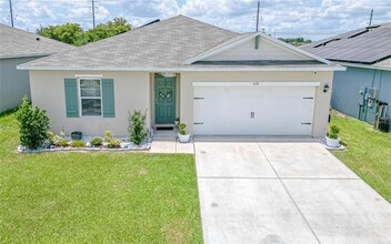 320 Boardwalk Ave in Haines City, FL - Foto de edificio - Building Photo