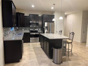 8584 Rindge Rd in Polk City, FL - Building Photo - Building Photo