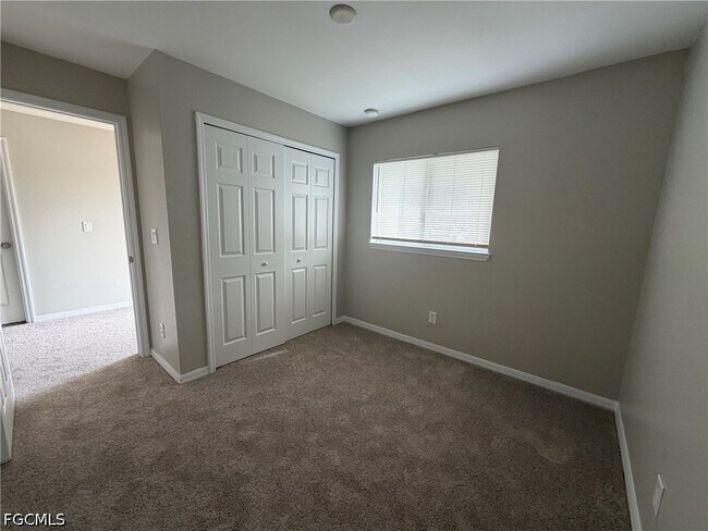 704 Gilbert Ave S in Lehigh Acres, FL - Building Photo - Building Photo