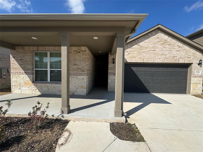 12016 Paseo de los Lagos Ln in Manor, TX - Foto de edificio - Building Photo