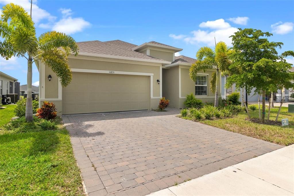 16831 Canopy Garden Dr in Port Charlotte, FL - Building Photo