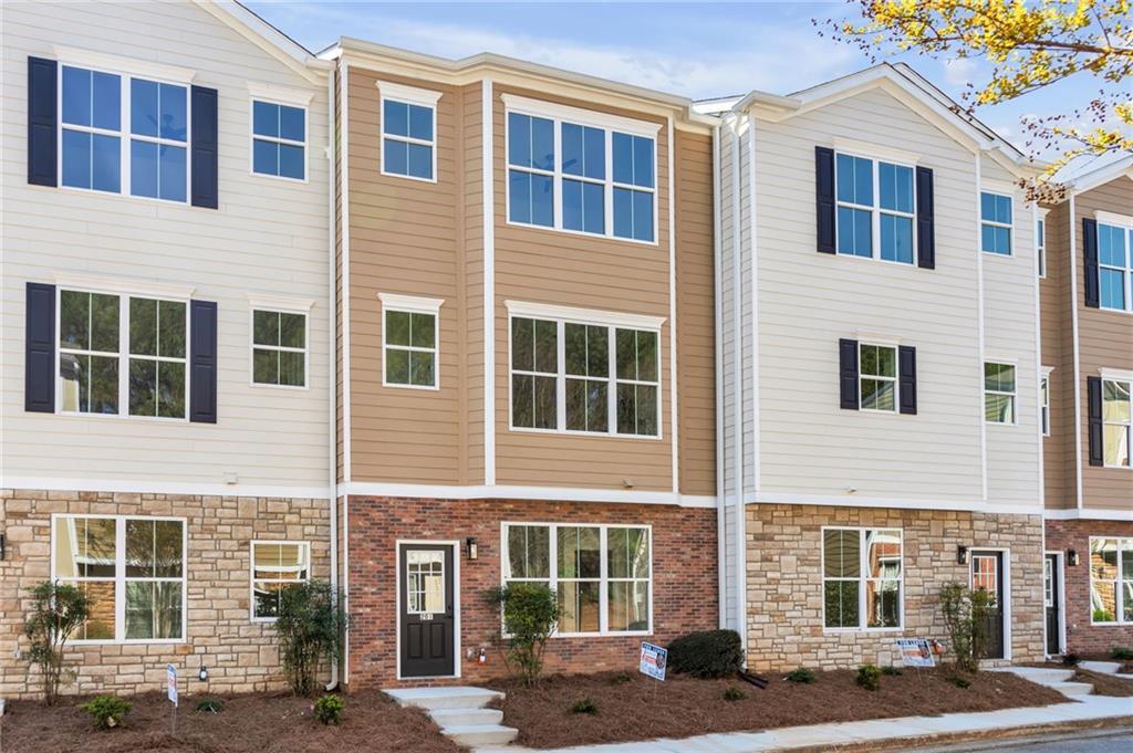 201 Riverstone Commons Cir in Canton, GA - Building Photo