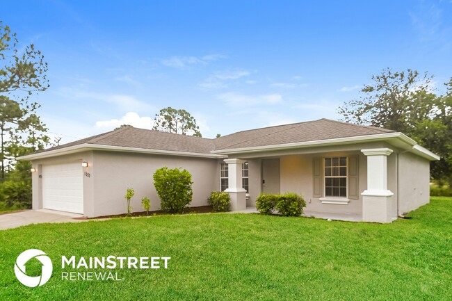 1057 Lilac St E in Lehigh Acres, FL - Building Photo - Building Photo