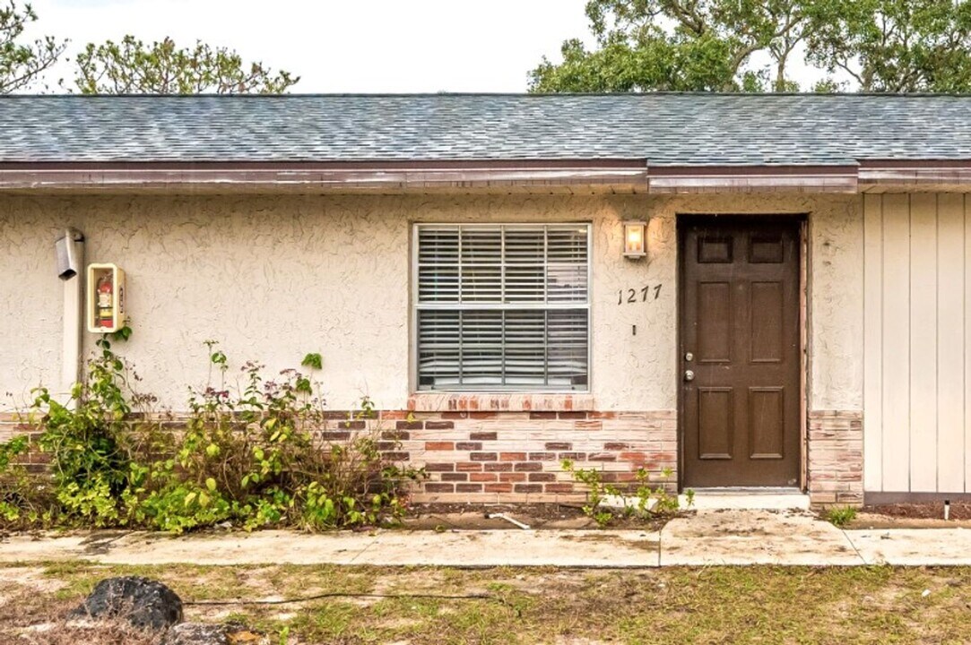 1277 Sylvia Ave in Spring Hill, FL - Building Photo