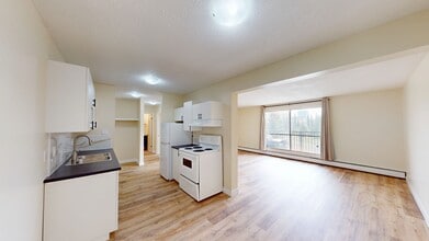10222-10105 105 Ave in Grande Prairie, AB - Building Photo - Building Photo