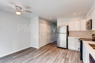 8976 W Dartmouth Pl in Lakewood, CO - Building Photo - Building Photo
