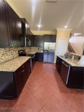 2427 Ashbury Cir in Cape Coral, FL - Foto de edificio - Building Photo