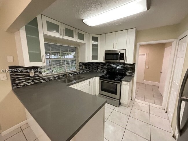 property at 14202 SW 110th Ave