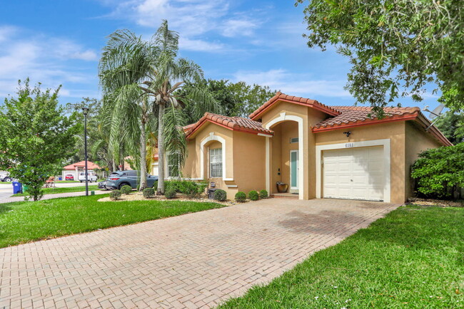 6181 NW 40th St in Coral Springs, FL - Foto de edificio - Building Photo