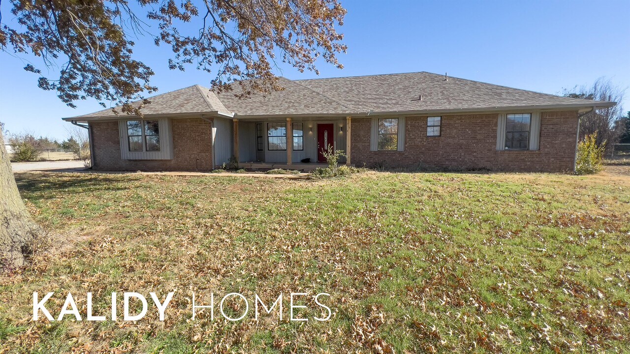 10712 Blue Fox Dr in Edmond, OK - Foto de edificio