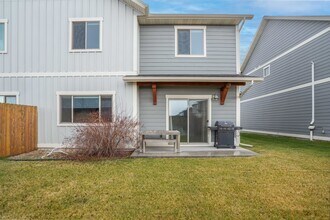 1403 Happy Ln, Unit A in Belgrade, MT - Building Photo - Building Photo