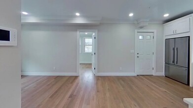 153 Foster St, Unit 1 in Boston, MA - Building Photo - Building Photo