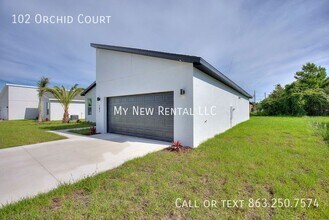 102 Orchid Ct in Poinciana, FL - Building Photo - Building Photo