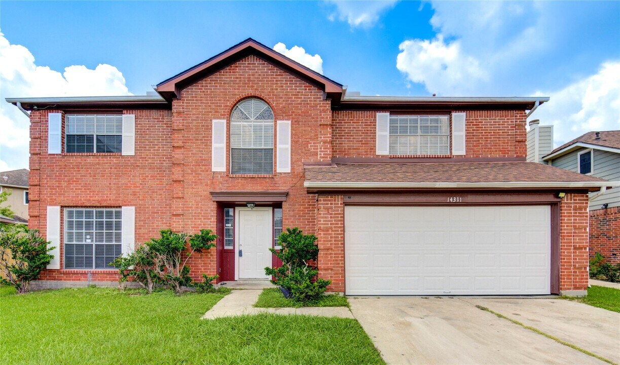 14311 Rainy Sun Cir in Houston, TX - Building Photo