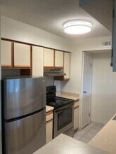 9100 Dr M.L.K. Jr St N, Unit 504 in St. Petersburg, FL - Building Photo - Building Photo