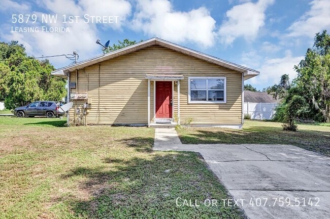 property at 5879 NW 1st St