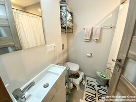 118 Buttonwood St, Unit 1 in Boston, MA - Building Photo