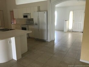 1180 SE Ladner St in Port St. Lucie, FL - Building Photo - Building Photo