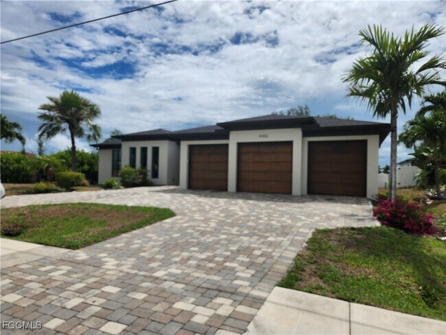 property at 4402 Chiquita Blvd S