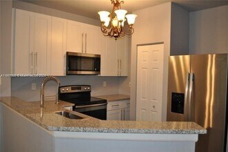 8306 Santa Monica Ave in Tamarac, FL - Building Photo - Building Photo