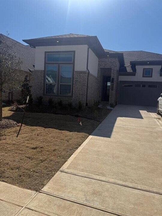 526 Red Eyed Vireo Ct in Magnolia, TX - Building Photo