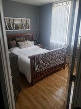 9 Main St, Unit H in Black River Falls, WI - Foto de edificio - Building Photo