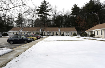 Pine Village Estates in Bedford, NH - Building Photo - Building Photo