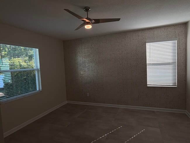 4452 Seven Canyons Dr in Kissimmee, FL - Foto de edificio - Building Photo