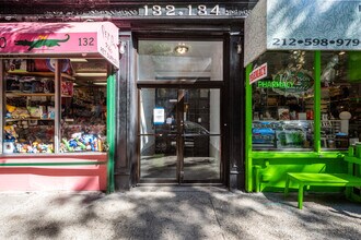 132-134 Thompson St in New York, NY - Building Photo - Building Photo
