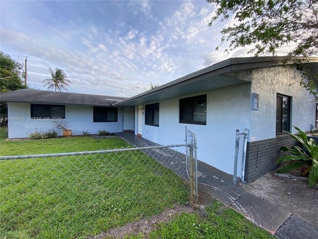 property at 5940 NW 20th St