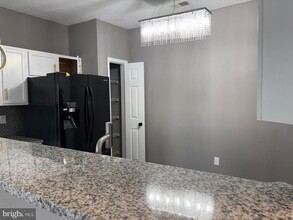 7416 Hindon Cir-Unit -C1 203 in Baltimore, MD - Building Photo - Building Photo