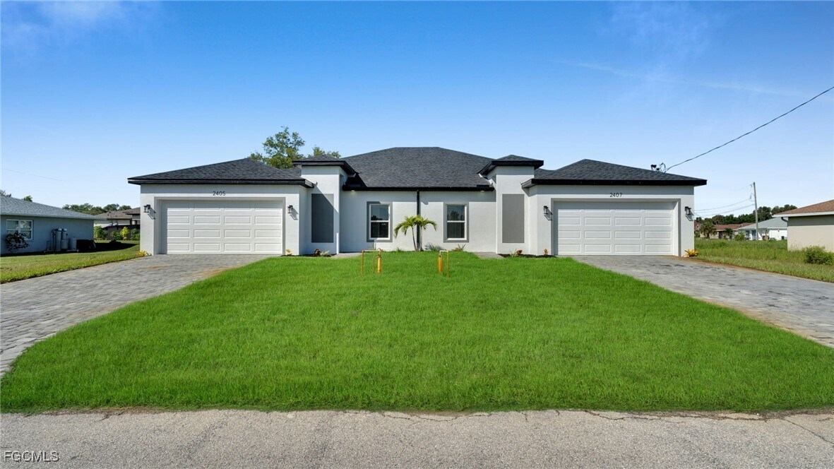 2405-2407 Xelda Ave N in Lehigh Acres, FL - Building Photo