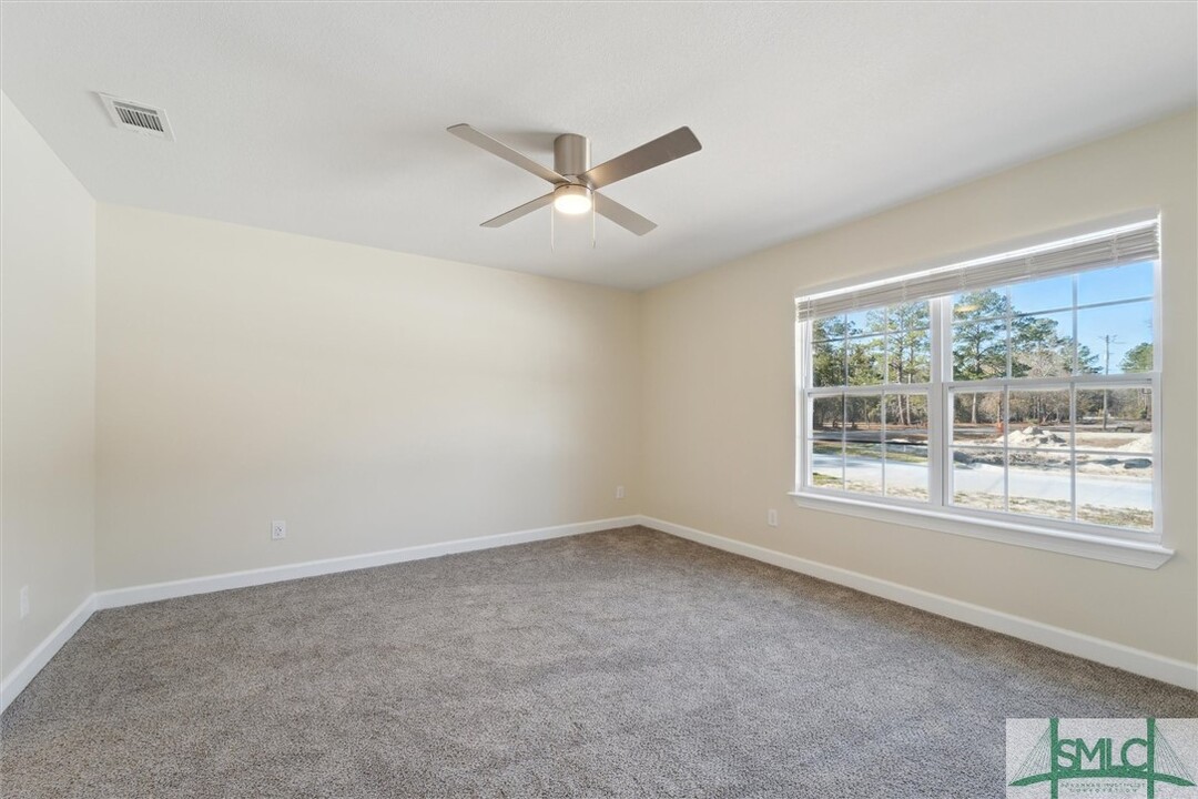 210 Peter King Rd in Riceboro, GA - Building Photo