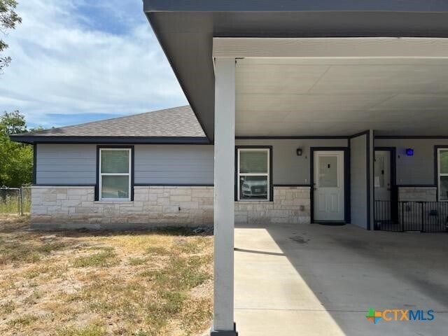 property at 907 E 3rd St