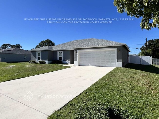 1192 SW Ithaca St in Port St. Lucie, FL - Building Photo - Building Photo