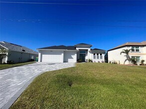 10099 Longbranch St in Port Charlotte, FL - Foto de edificio - Building Photo