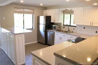 16571 Blatt Blvd-Unit -201 in Weston, FL - Building Photo - Building Photo