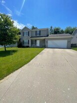1113 Tartan Ln in Walled Lake, MI - Building Photo