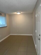 5001 Wiles Rd in Coconut Creek, FL - Building Photo - Building Photo